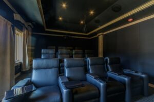 Custom Cinema building containing a 9.2 Surround sound system home theater, with the Crestron Home Automation system in Cupertino