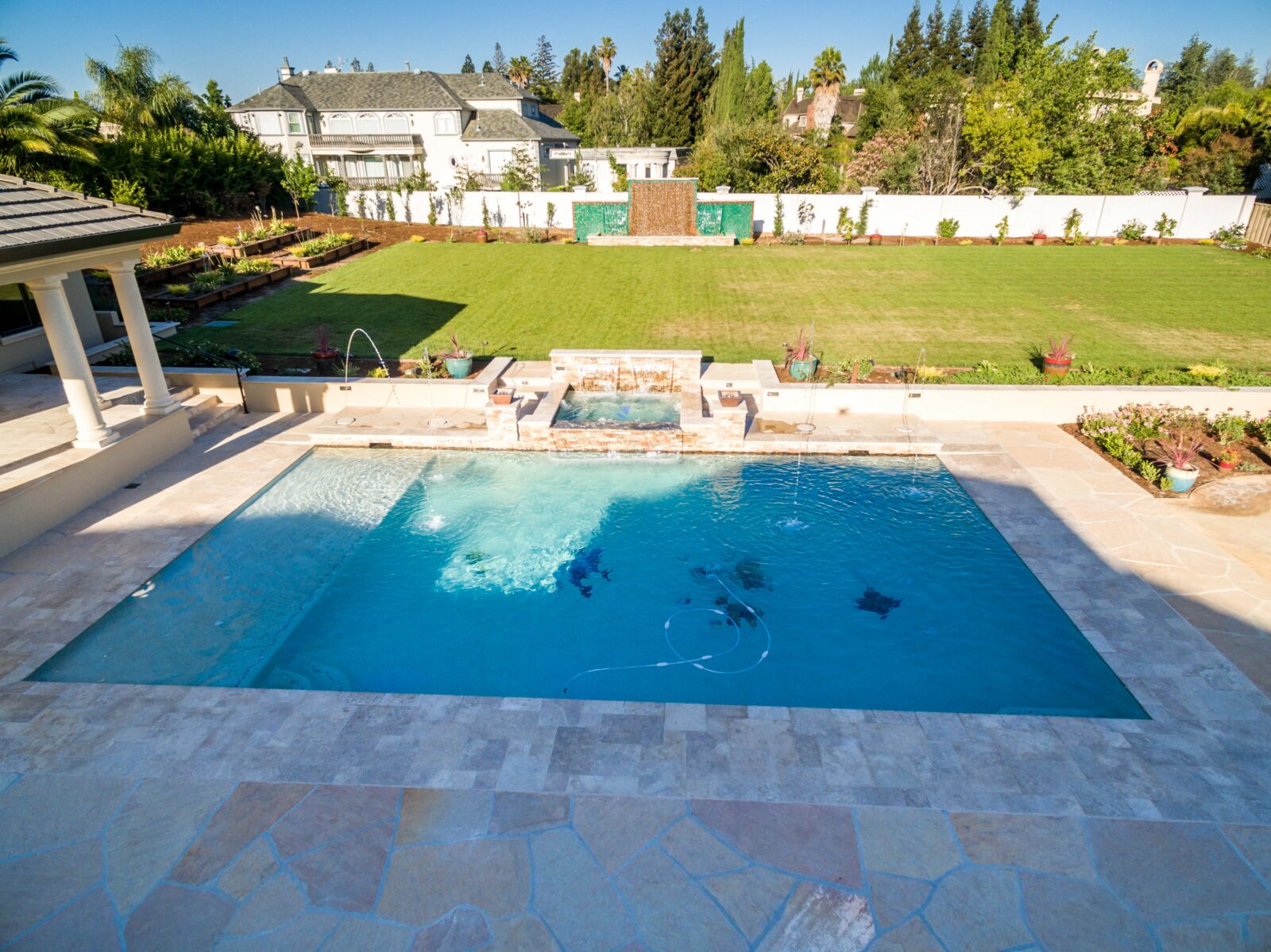 Backyard view of a beautiful, functional and comfortable home to enjoy in Cupertino